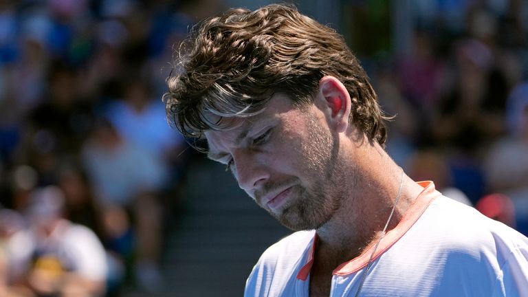 Cameron Norrie of Britain reacts during his first round loss to Matteo Berrettini of Italy at the Australian Open tennis championship in Melbourne, Australia, Tuesday, Jan. 14, 2025. (AP Photo/Asanka Brendon Ratnayake)