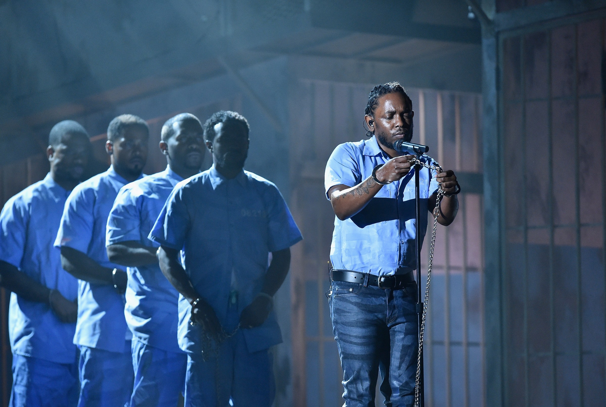 Rapper Kendrick Lamar performing onstage