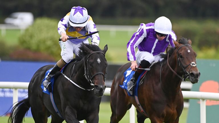 Green Impact and Shane Foley (left) win the KMPG Champions Juvenile Stakes