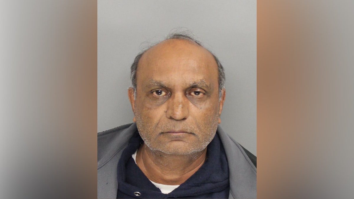 A mugshot of Mahendra Patel