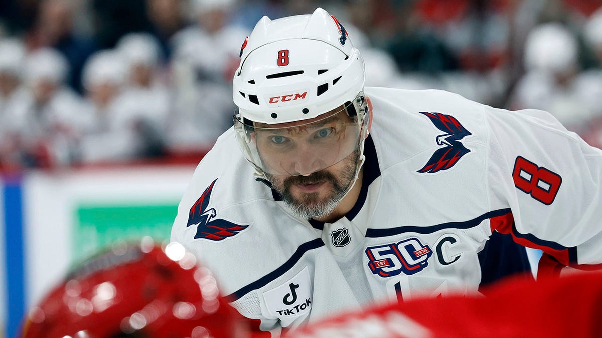 Alex Ovechkin watches the puck drop