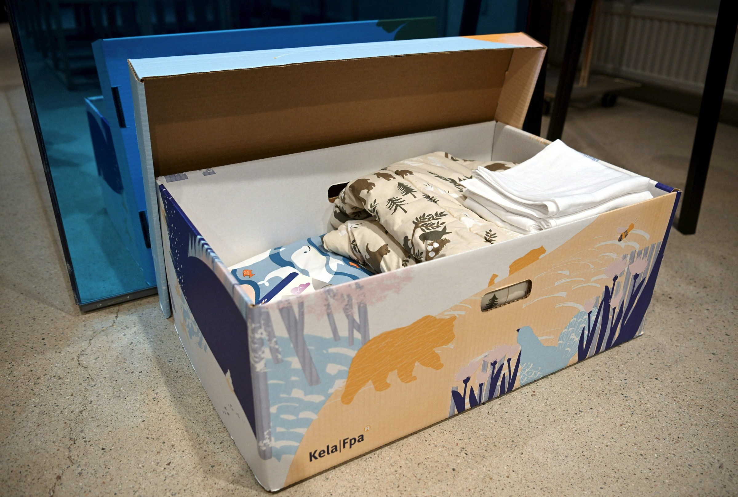 Box of maternity clothes.