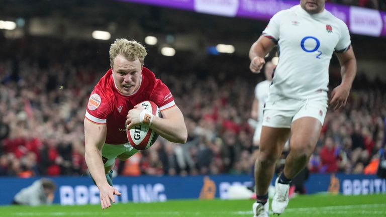 Wales' Blair Murray dives over to score a try that was disallowed during the Six Nations rugby union match between Wales and England at the Principality Stadium in Cardiff, Wales, Saturday, March 15, 2025. (AP Photo/Alastair Grant)
