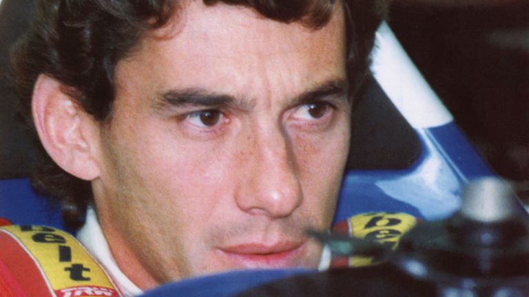 Brazilian Formula One driver Ayrton Senna concentrates before the qualifying practice for the San Marino Grand Prix at Imola, Italy on April 29. 1994. (AP Photo/Massimo Sambucetti)