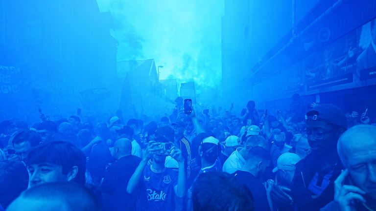 Fans let off blue flares ahead of Everton's final game at Goodison Park