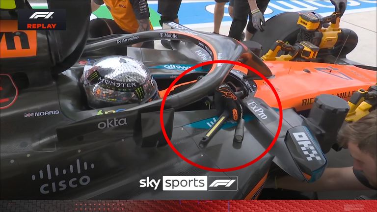 Watch the bizarre moment a mechanic left a torch in Lando Norris' cockpit after he set off to begin practice one at the Miami Grand Prix.