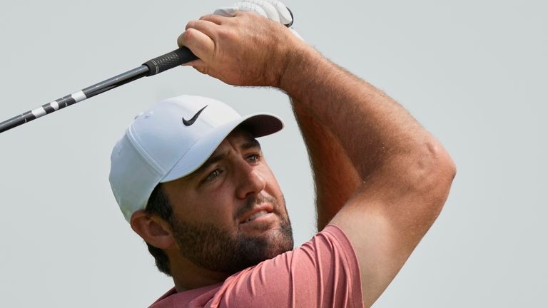 Scottie Scheffler hits from the fifth tee during the third round of the Memorial golf tournament Saturday, May 31, 2025, in Dublin, Ohio. (AP Photo/Sue Ogrocki)