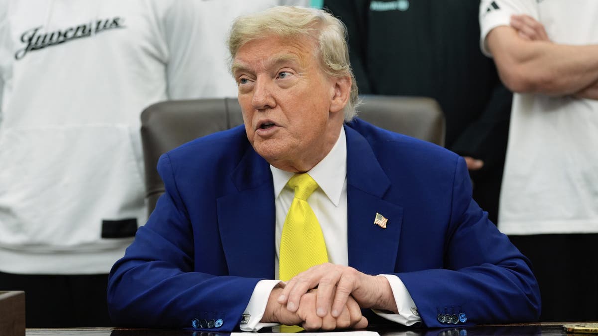 President Donald Trump meets with members of the Juventus soccer club in the Oval Office of the White House, Wednesday, June 18, 2025, in Washington. (AP Photo/Alex Brandon)