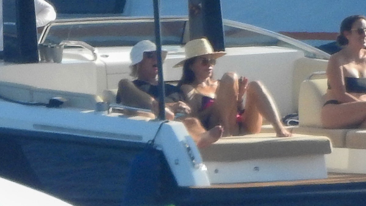 Jeff Bezos and Lauren Sanchez relaxing on a daybed in one of the speedboats on the coast of Croatia.