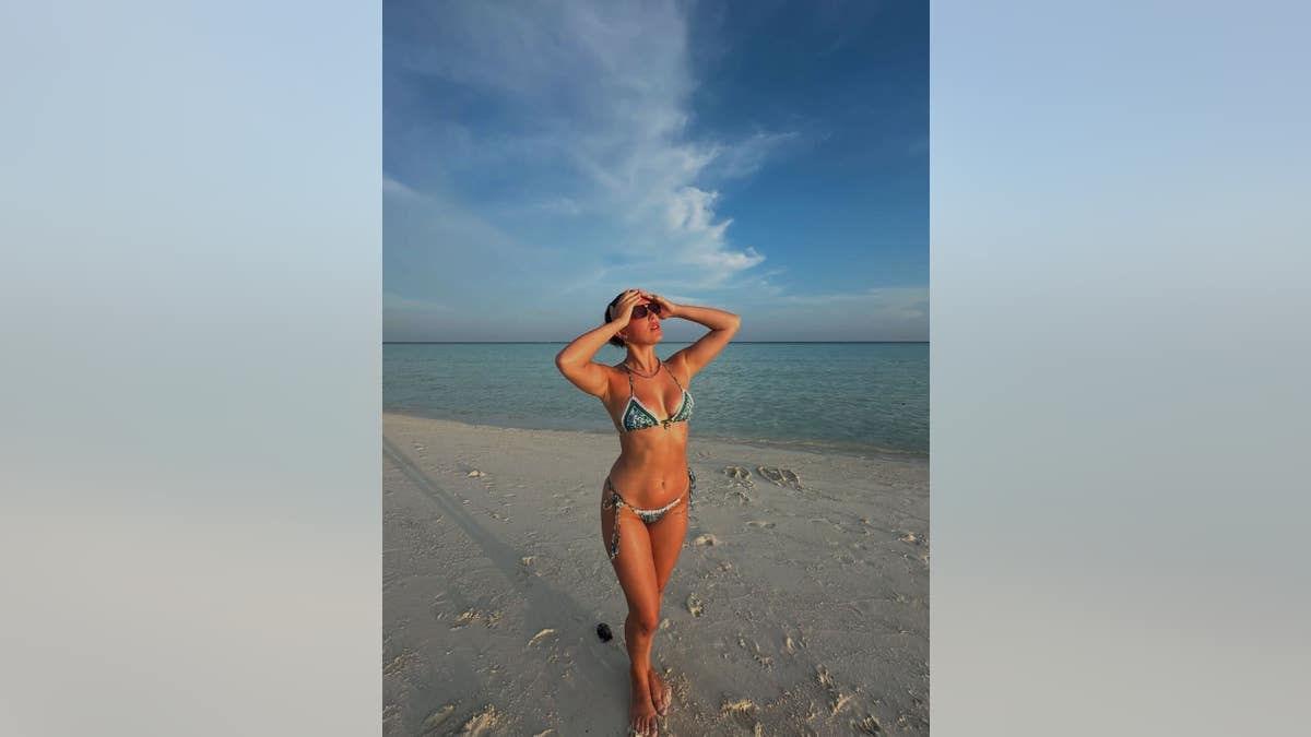 millie bobby brown wears a string bikini on the beach