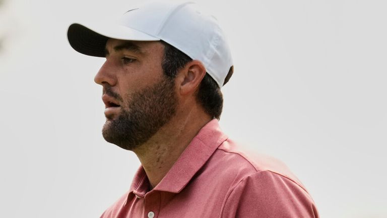 Scottie Scheffler tosses his club after missing a putt on the ninth green during the third round of the Memorial golf tournament Saturday, May 31, 2025, in Dublin, Ohio. (AP Photo/Sue Ogrocki)