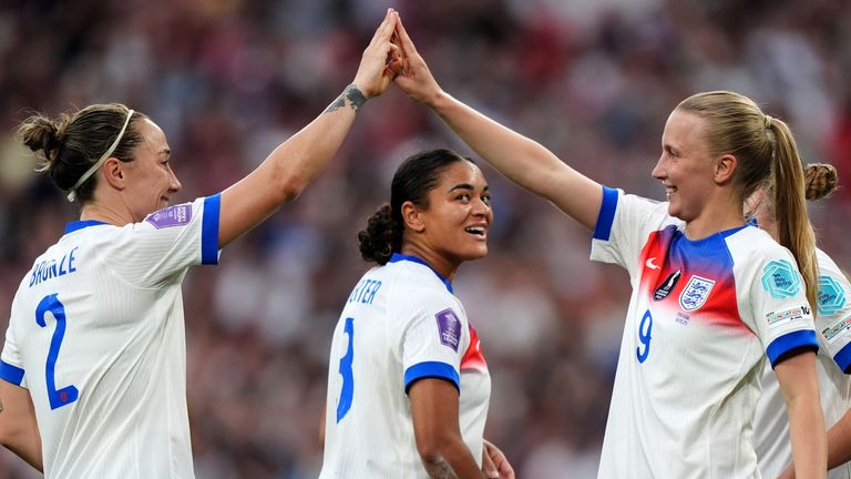 England's Aggie Beever-Jones (right) celebrates with Lucy Bronze after scoring the third goal against Portugal