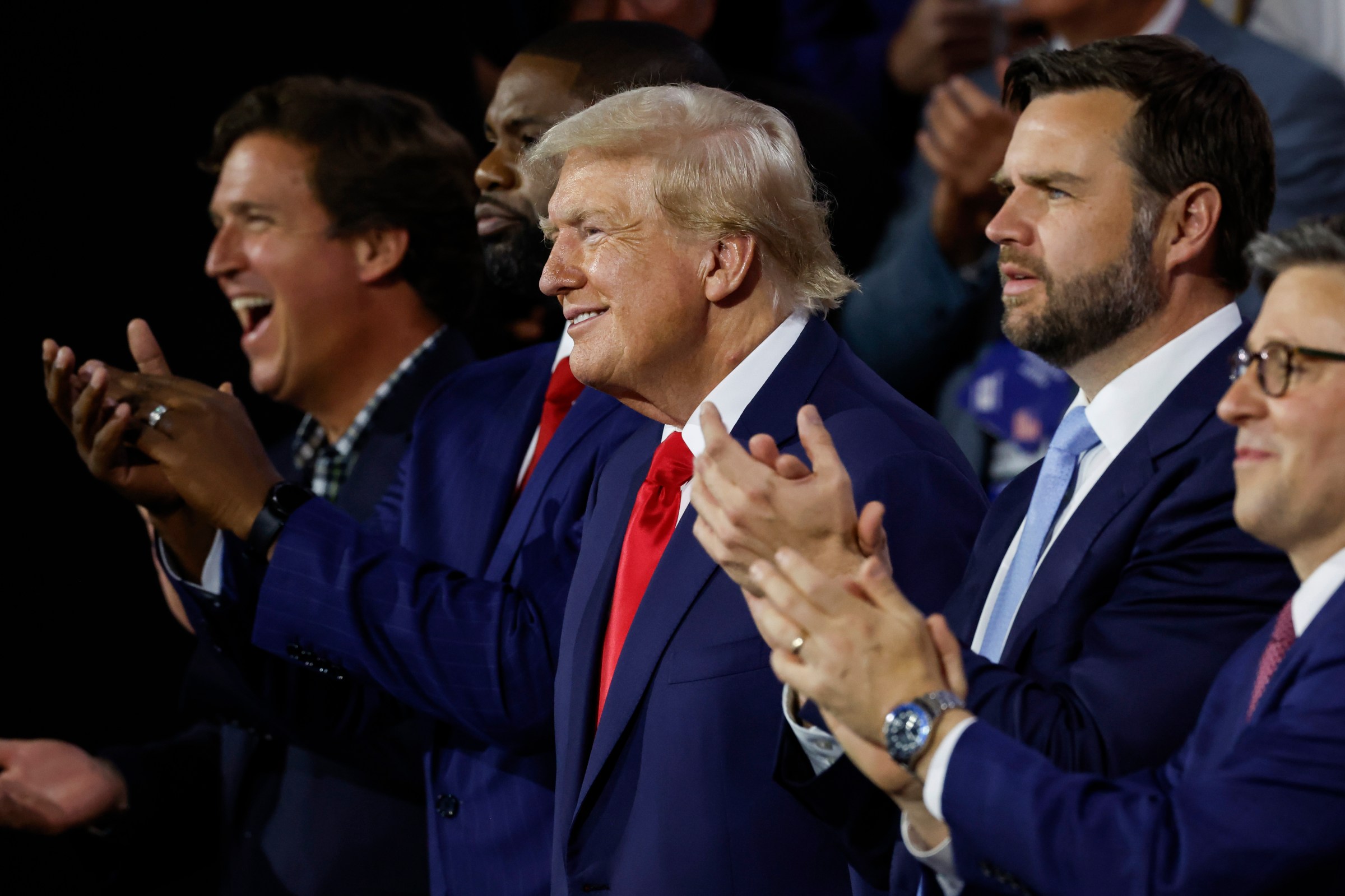 Tucker Carlson and VP nominee JD Vance joined Trump at the Republican National Convention, July 15, 2024 in Milwaukee, Wisconsin. 
