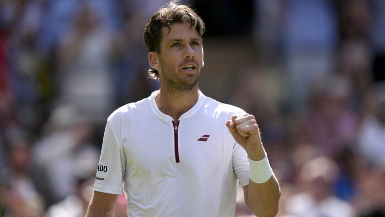 Cameron Norrie celebrates winning the fourth set and the match against Frances Tiafoe on day three of the 2025 Wimbledon Championships at th