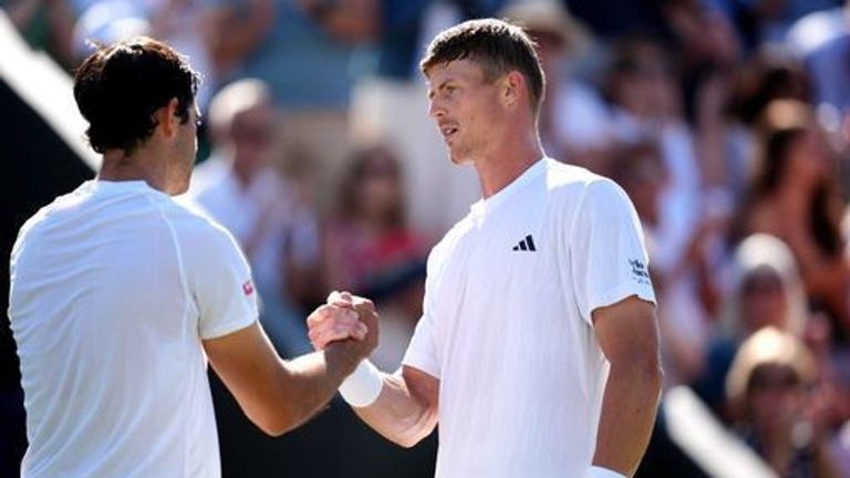 Billy Harris following his defeat to Nuno Borges (left) on day three of the 2025 Wimbledon Championships at the All England Lawn Tennis and 