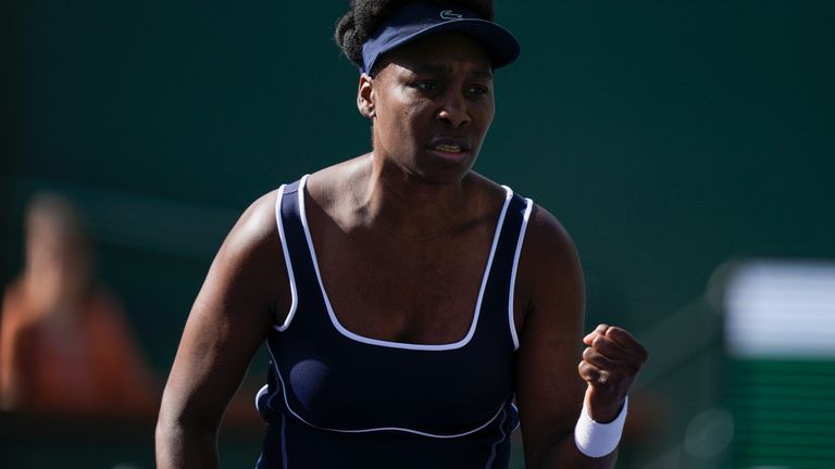 Venus Williams, of the United States, celebrates winning a point against Nao Hibino, of Japan, at the BNP Paribas Open tennis tournament
