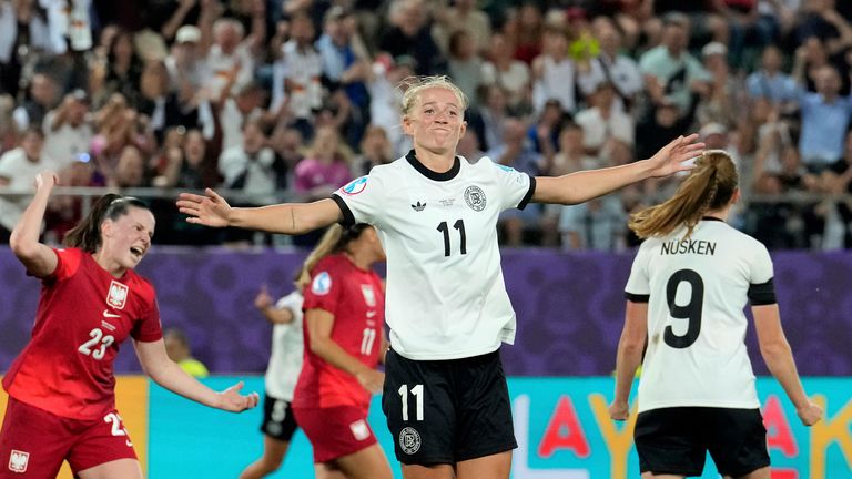 Germany's Lea Schueller celebrates after scoring her side's second goal during the Euro 2025, group C, soccer match between Germany and Poland at Arena St. Gallen in St. Gallen, Switzerland, Friday, July 4, 2025. (AP Photo/Martin Meissner)