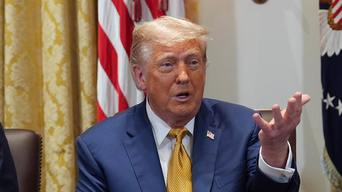 Trump motions during Cabinet meeting