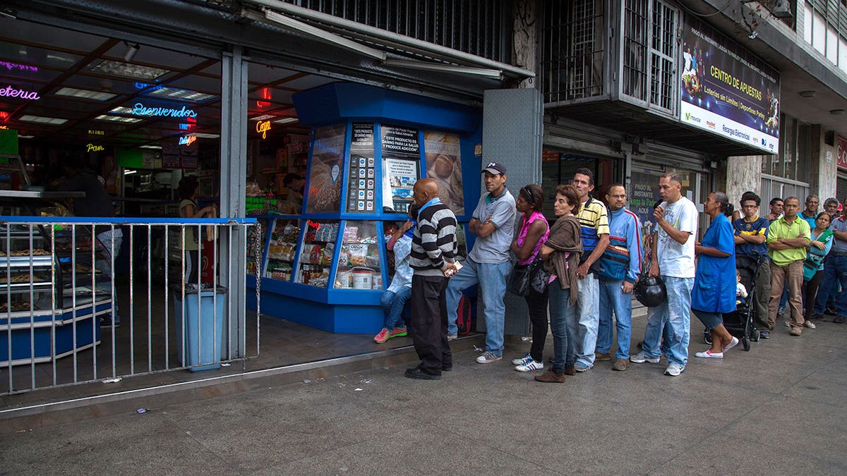 People standing in line for bread in Venezuela