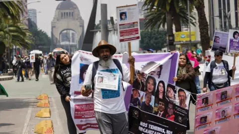 Reuters Demonstrators and relatives of missing persons hold a protest to mark the International Day of the Victims of Enforced Disappearances, in Mexico City