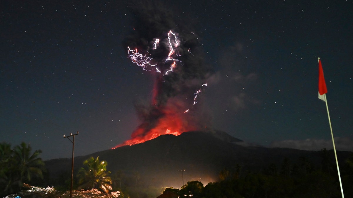 Lightning strikes as Mount Lewotobi Laki-Laki sends volcanic material into the air
