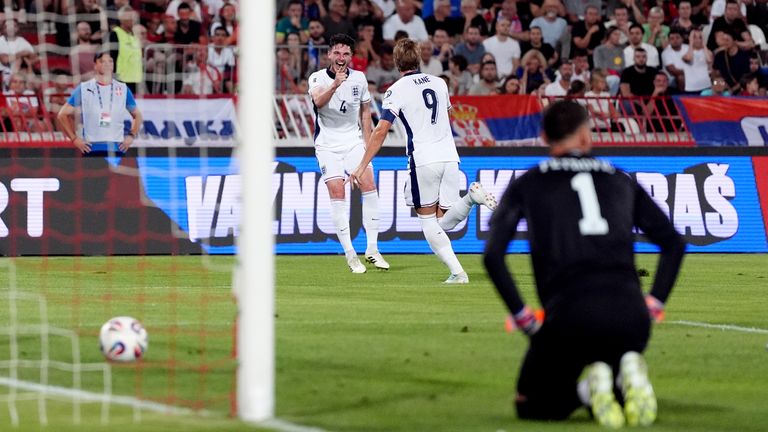 Harry Kane celebrates his opening goal with Declan Rice