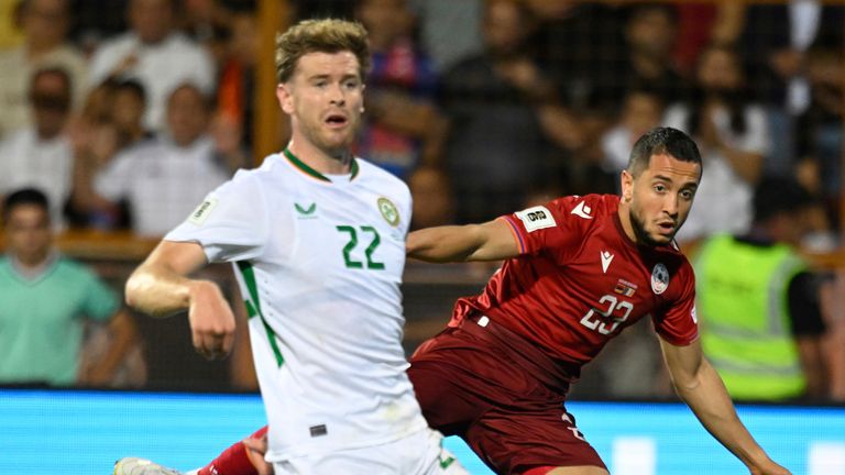 Ireland's Nathan Collins, left, struggles for the ball with Armenia's Vahan Bichakhchyan during a World Cup 2026 group F qualifying soccer match between Armenia and Ireland at the Vazgen Sargsyan stadium in Yerevan, Armenia, Tuesday, Sept. 9, 2025. (AP Photo/Hakob Berberyan)