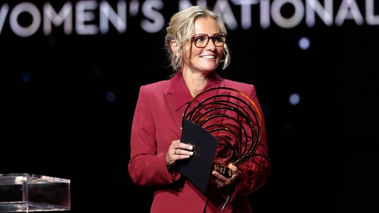 England's football team's Dutch head coach Sarina Wiegman reacts .after receiving the Johan Cruyff Best Women...s Club team's Head Coach during the 2025 Ballon d'Or France Football award ceremony at the Theatre du Chatelet in Paris on September 22, 2025. (Photo by Franck FIFE / AFP)