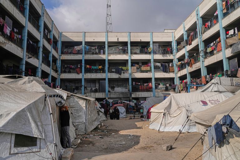 Tents sit in the courtyard of a school run by UNRWA