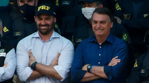 Getty Images  Eduardo Bolsonaro and Jair Bolsonaro 