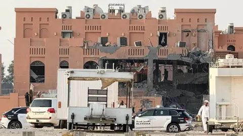 Reuters A damaged building in Doha, Qatar, following an Israeli strike targeting senior Hamas leaders (9 September 2025)