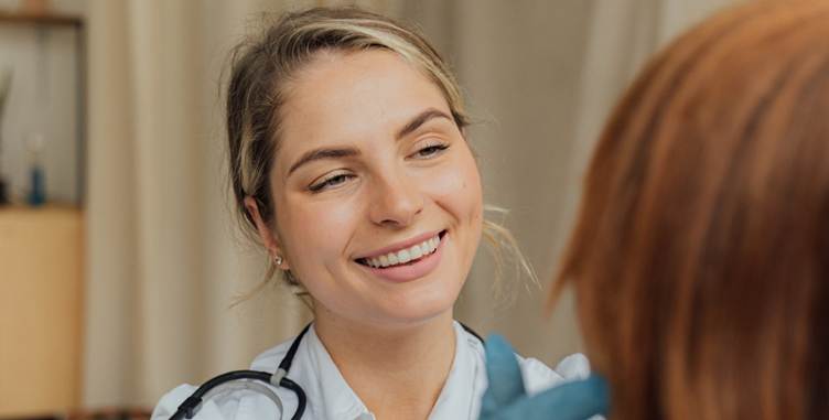 A person smiling with her eyes closed

AI-generated content may be incorrect.