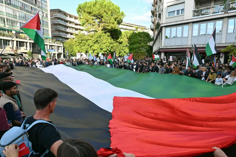 Pro-Palestinian protesters react.