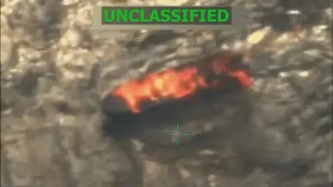 Reuters Image shows an explosion on board of one of the boats attacked by the US in international waters in the Caribbean