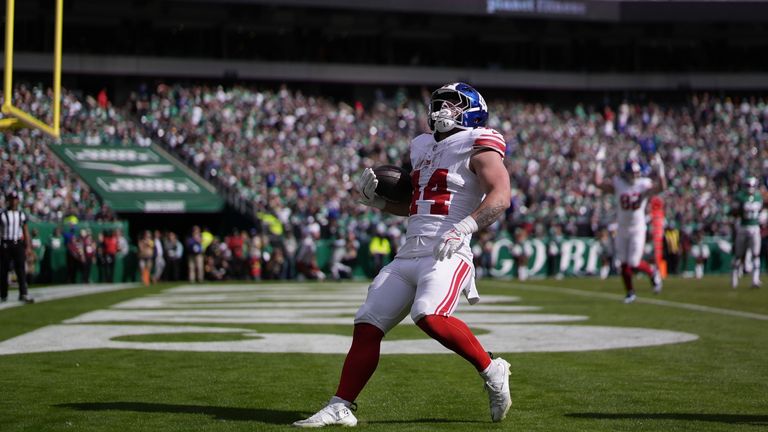 New York Giants' Cam Skattebo after scoring a touchdown during an NFL game against the Philadelphia Eagles (AP Photo/Matt Slocum)
