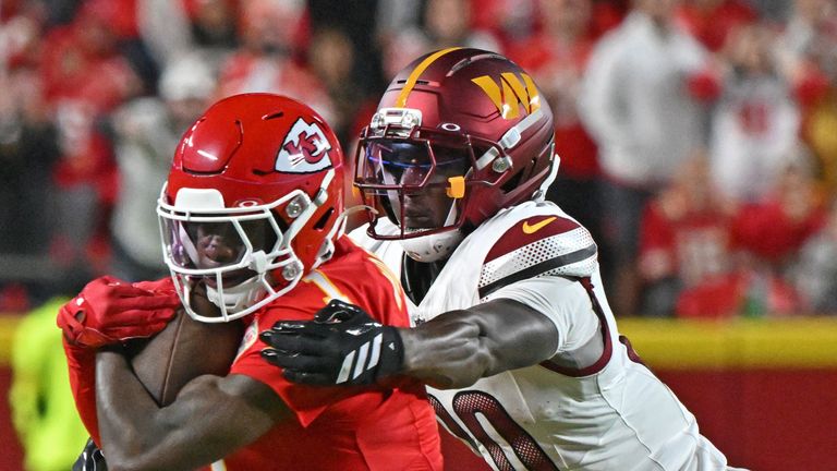 Kansas City Chiefs wide receiver Xavier Worthy (1) runs up field against Washington Commanders cornerback Mike Sainristil (0)