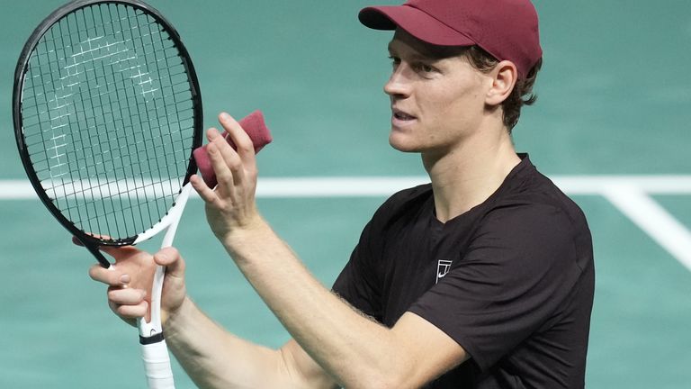 Jannik Sinner celebrates after defeating Zizou Bergs in straight sets