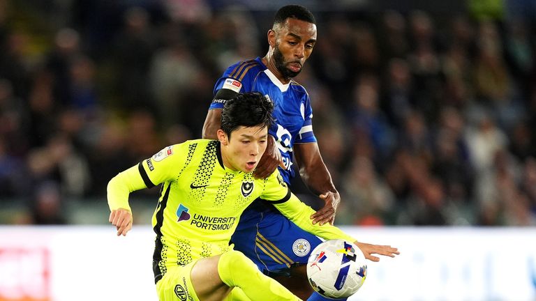 Leicester City's Ricardo Pereira (right) and Portsmouth's Yang Min-Hyeok battle for the ball at the King Power Stadium