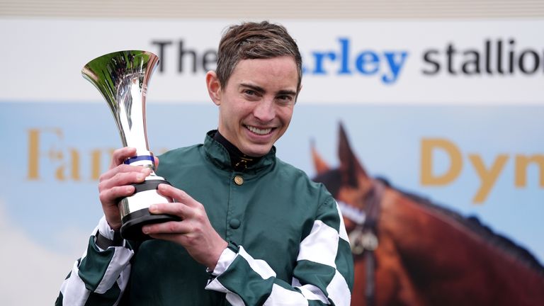 Winning jockey James Doyle celebrates Dewhurst Stakes glory