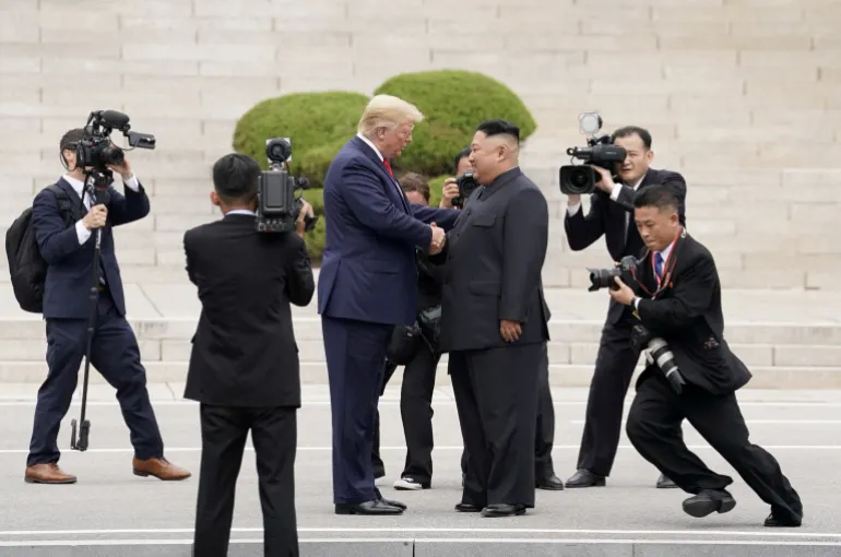 REUTERS PICTURES 40th ANNIVERSARY COLLECTION: U.S. President Donald Trump meets with North Korean leader Kim Jong Un at the demilitarized zone separating the two Koreas, in Panmunjom, South Korea, June 30, 2019. REUTERS/Kevin Lamarque SEARCH "REUTERS PICTURES 40th ANNIVERSARY COLLECTION" FOR THIS PACKAGE