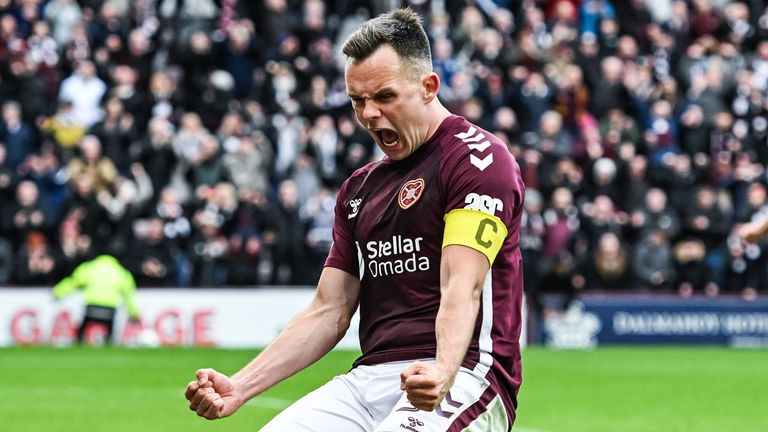Hearts' Lawrence Shankland celebrates after scoring a penalty to make it 3-1