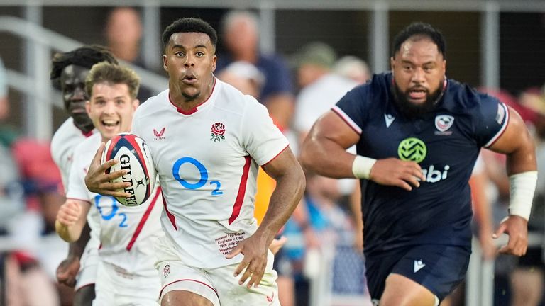 England's Immanuel Feyi-Waboso makes a break during the men's rugby union international between England and the USA at Audi Field in Washington, Saturday, July 19, 2025. (AP Photo/Alex Brandon)