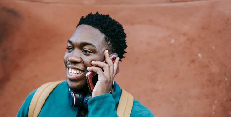 A person talking on a cell phone

AI-generated content may be incorrect.