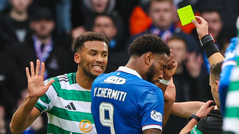 GLASGOW, SCOTLAND - NOVEMBER 02: Referee Nick Walsh shows Celtic's Auston Trusty a yellow card for his challenge on Jack Butland during a Premier Sports Cup Semi-Final match between Celtic and Rangers at Hampden Park, on November 02, 2025, in Glasgow, Scotland. (Photo by Craig Williamson / SNS Group)