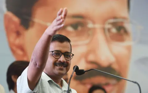 Hindustan Times via Getty Images) NEW DELHI, INDIA - MAY 1: Delhi Chief Minister Arvind Kejriwal addresses labourers and employees during the Delhi Shramik Sammelan on the occasion of International Labour day on May 1, 2018 in New Delhi, India. (Photo by Raj K Raj/Hindustan Times via Getty Images)