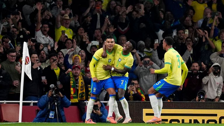 Casemiro celebrates scoring Brazil's second against Senegal