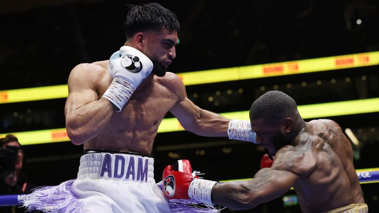 Adam Azim hurts Kurt Scoby