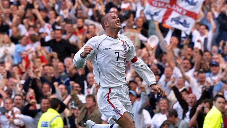 David Beckham celebrates after his free-kick against Greece helped England qualify for the 2002 World Cup