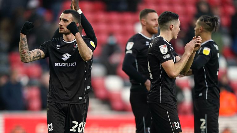 Troy Parrott (left) spent time on loan at MK Dons