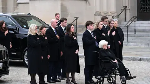 Getty Images Dick Cheney's family outside the funeral